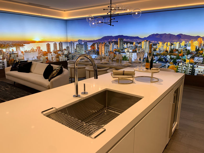 Undermount kitchen sink in a modern luxury kitchen with beautiful city and mountain views