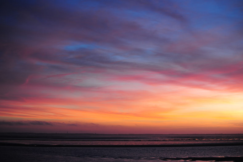 Sonnenuntergang über dem Wattenmeer am 25. März 2017