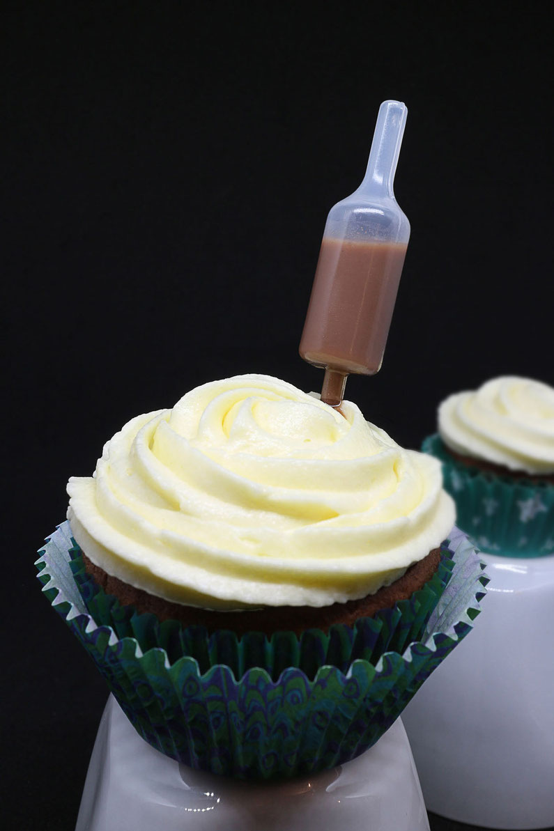 tipsy chocolate cupcakes with white chocolate frosting and homemade chocolate liqueur