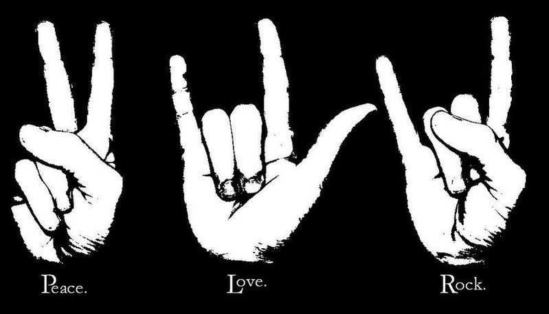 mani in segno di pace, amore e rock