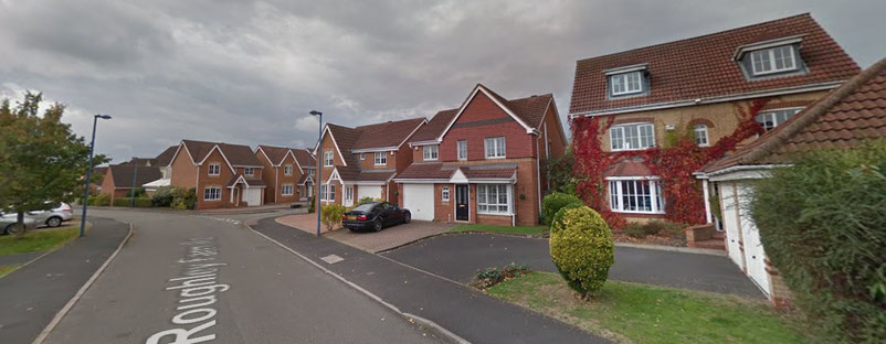 There is a variety of different house types on the Roughley estate, here on Roughley Farm Road, built in a modern traditional style.