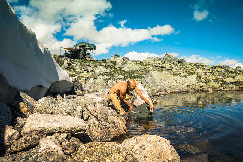 Filling up the Lifesaver Jerrycan with glacial water, like a true overlander.