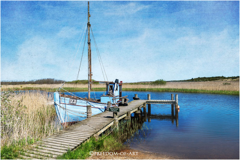 Fischerboot am Steg