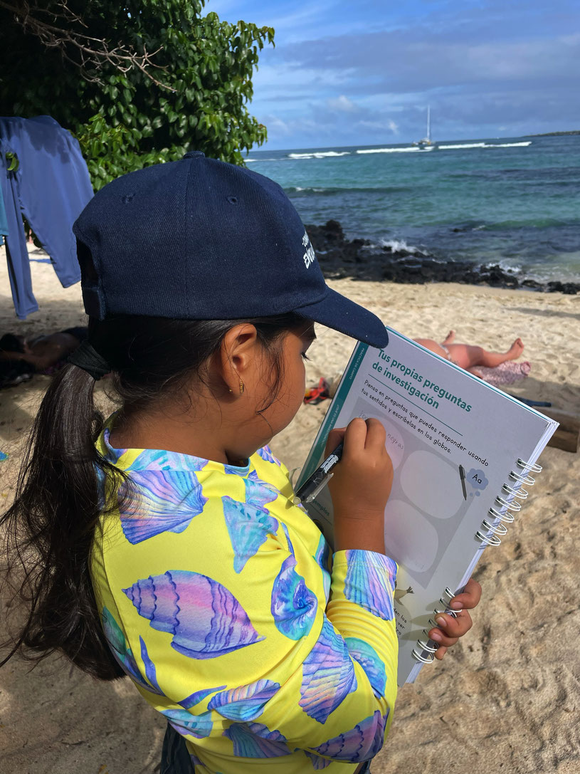 Young girl from the Galapagos doing a course to learn more about marine science and the ocean.