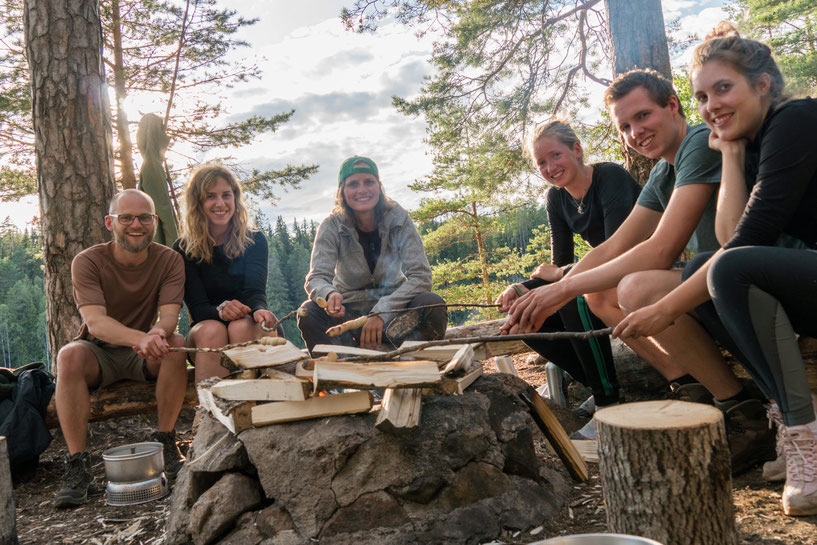 Making new friends on a holiday on the canoe trip in Sweden. Always around a campfire of course.