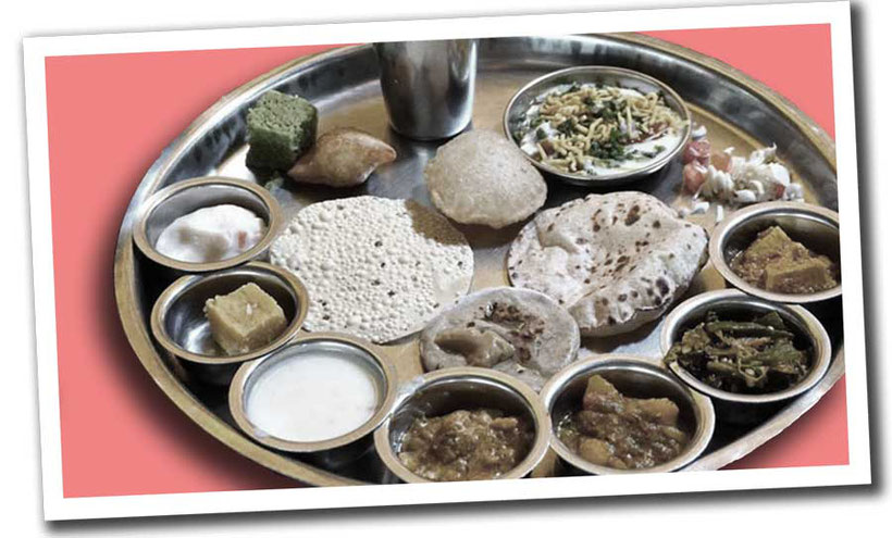 Indian food on a silver tray