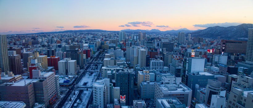 札幌市の街並みと法人清掃サービス対応エリアのイメージ