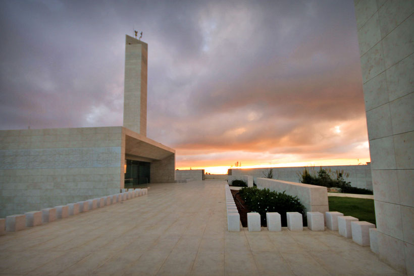 In front of the Mausoleum in Ramallah that contains the tomb of Yasser Arafat. © Sabrina Iovino | JustOneWayTicket.com