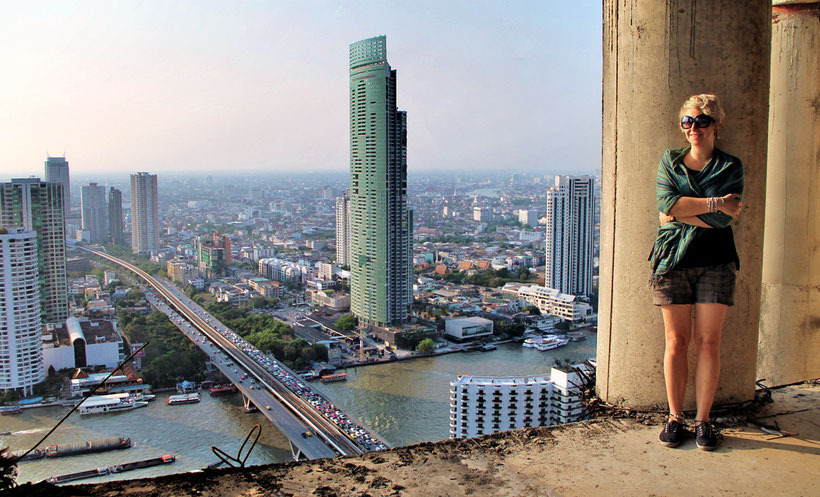 View over the river from the Sathorn Unique Building, Bangkok, Thailand. © Sabrina Iovino | JustOneWayTicket.com