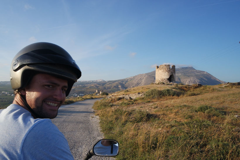 Max driving a quad on Santorini