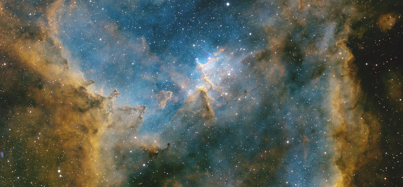 Astrophoto of the young star cluster Melotte-15 at the center of the Heart Nebula.