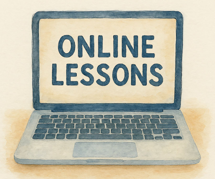 A laptop with the words Online Lessons on screen