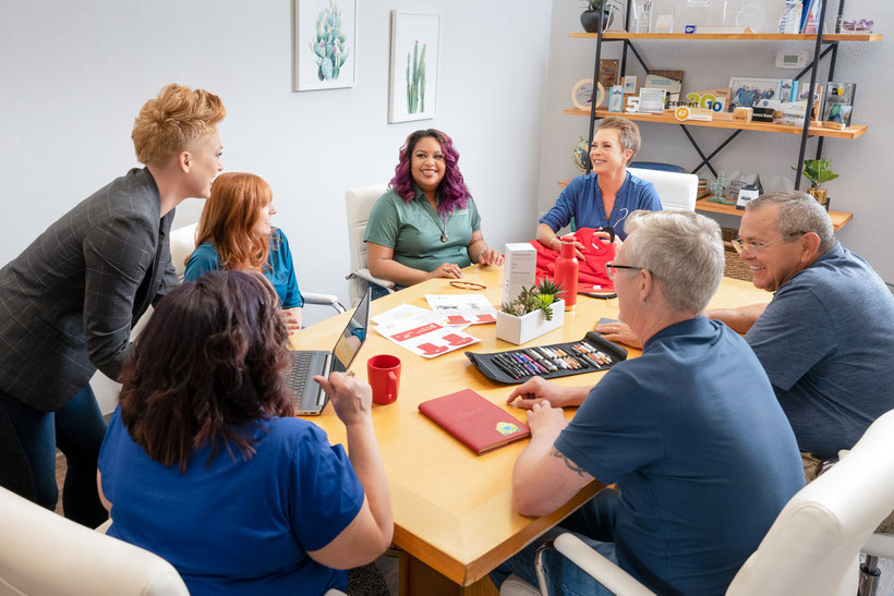 Conference meeting with employees and employers smiling