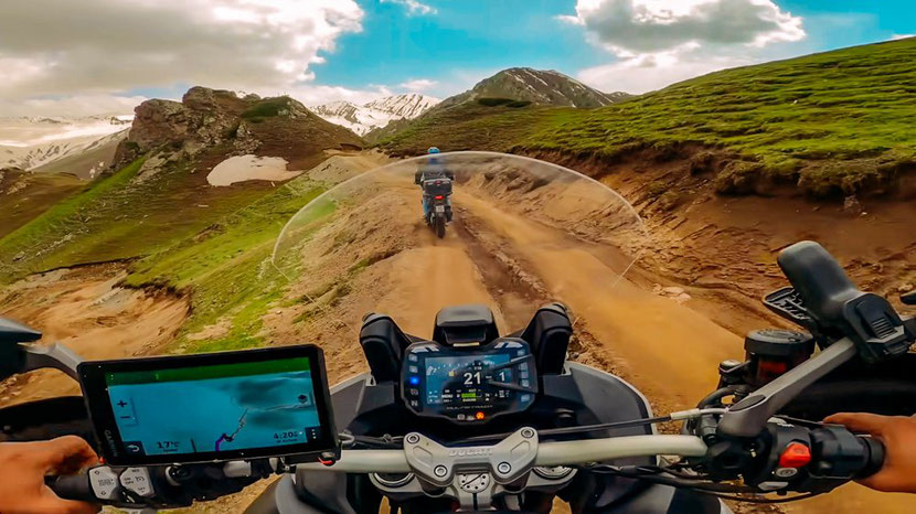 motorcyclists driving through the mountains 