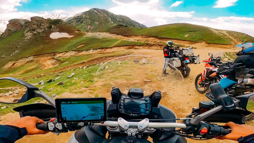 a group of motorcyclists on a motorcycle tour 