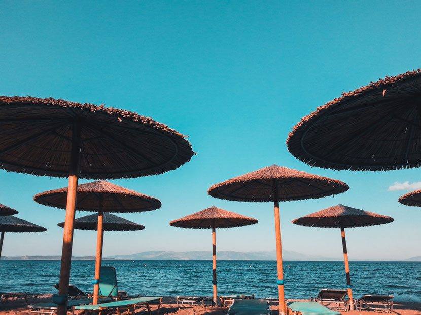 clean beach with sunbeds and umbrellas close to Athens : Nea Makri - Marathonas 