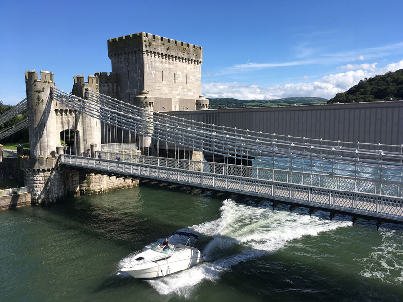 Conwy bridge: You can see this bridge, when you are crossing the bridge (right beside that one, the one mentioned in the text) to enter Conwy town.