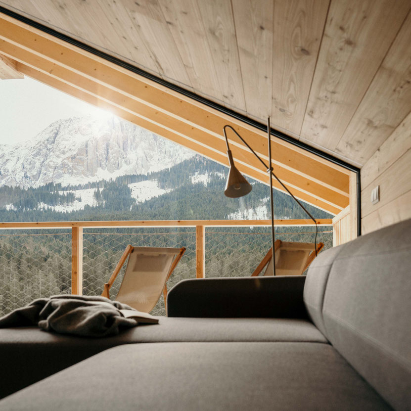 Karerhof in the Dolomites, South Tyrol: Modern apartments on a secluded organic mountain farm. With breakfast, stunning views and pure nature – perfect for a peaceful alpine escape.