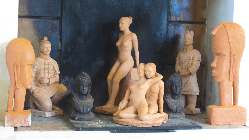 sculptures argile nu assis guerriers chinois couple enlacé têtes africaines