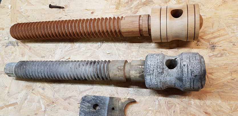 Old and new wooden vice screw