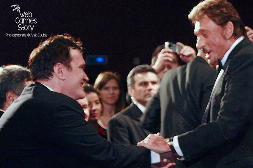 Quentin Tarantino et Johnny Hallyday, lors de la projection du film "Vengeance" de Johnnie To - Festival de Cannes - 2009 - Photo © Anik COUBLE