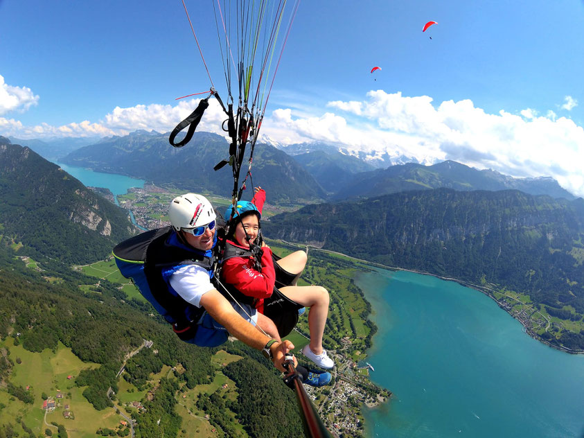 Interlaken Paragliding capital of the world lakes snowcapped Mountains