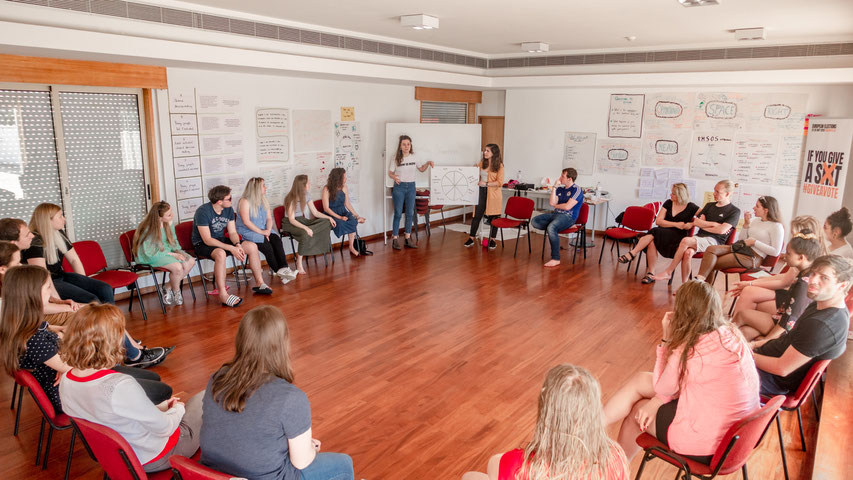 Group picture during an activity of 'Give A Vote' in Porto