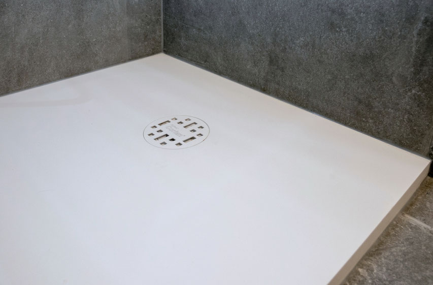 Original Corian shower trays can be custom-fitted in different size niches