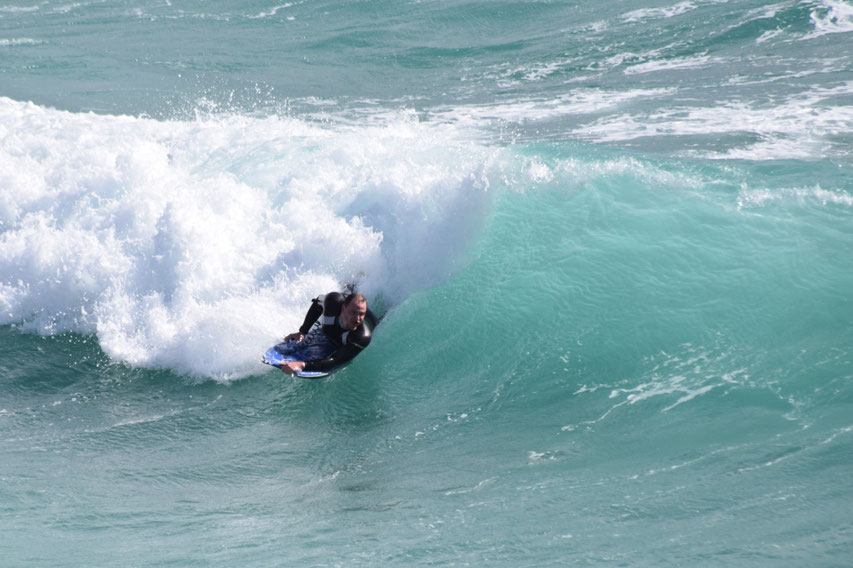 bodyboarding in surf at Mareta, Sagres