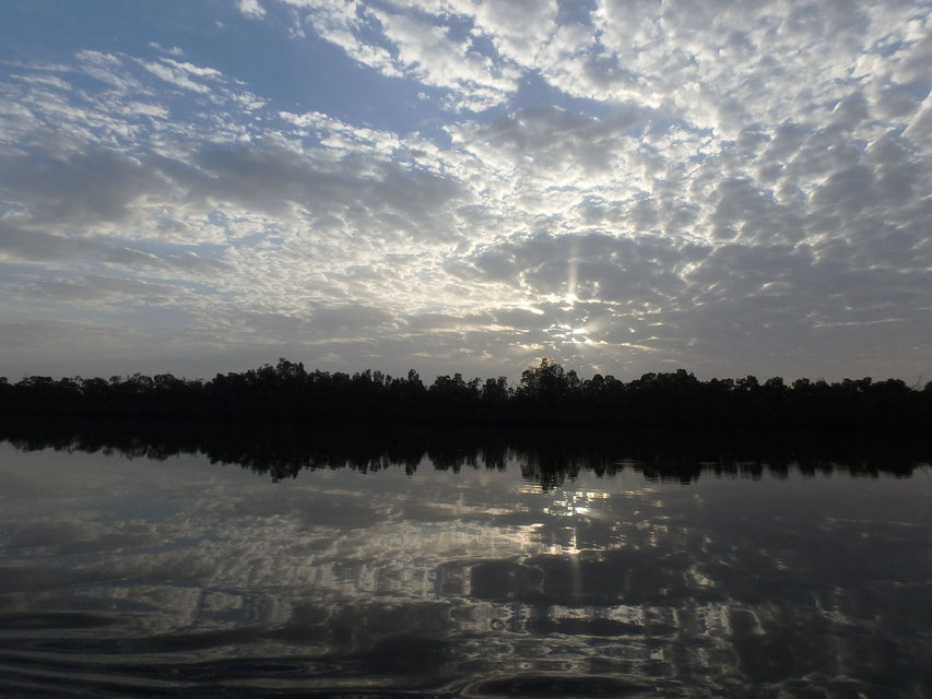 sunrise and reflections, Tumani Tenda