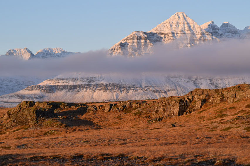 Mountains and low cloud at sunrise, East Fjords, Iceland