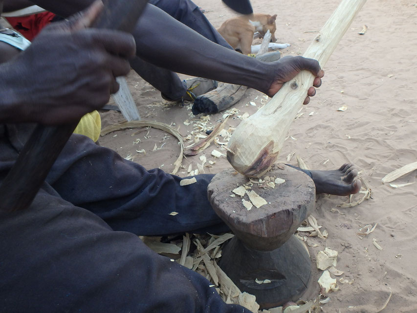 carving a pestle, Tumani Tenda, Gambia