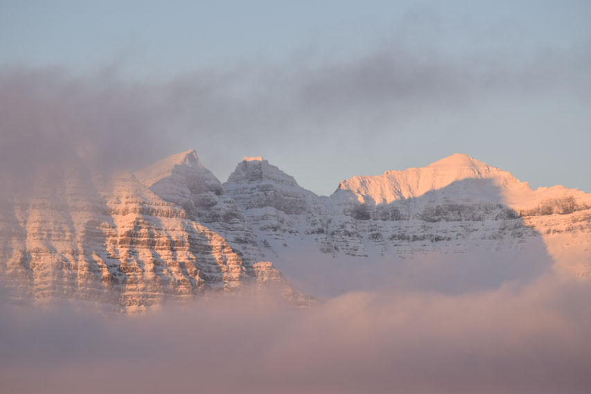 Mountains in cloud at sunrise, East Fjords, Iceland