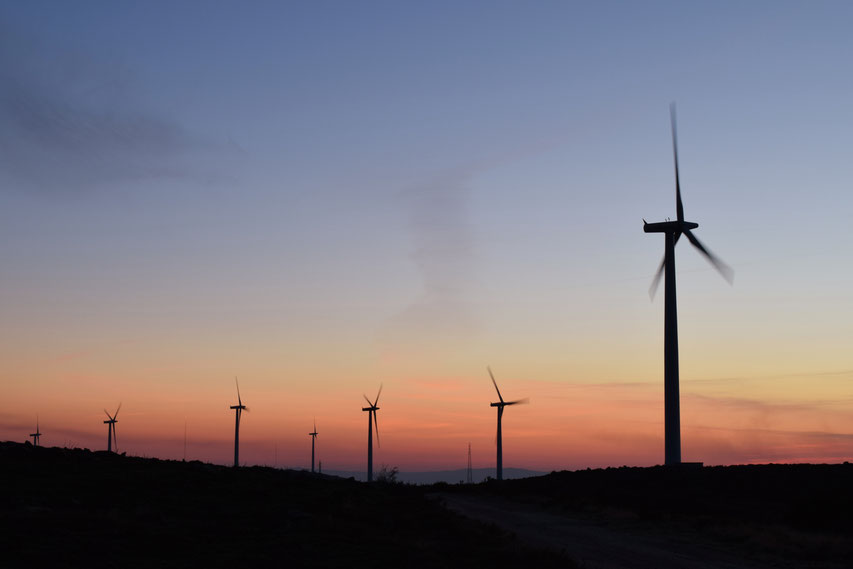 wind turbines Portugal why travel sunset