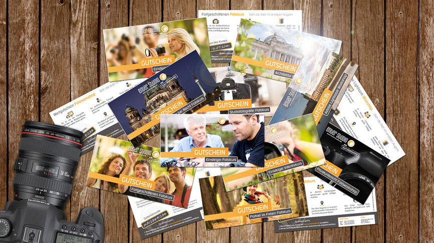 Gutscheine für Fotokurse und Fotoworkshops Stapel Kamera