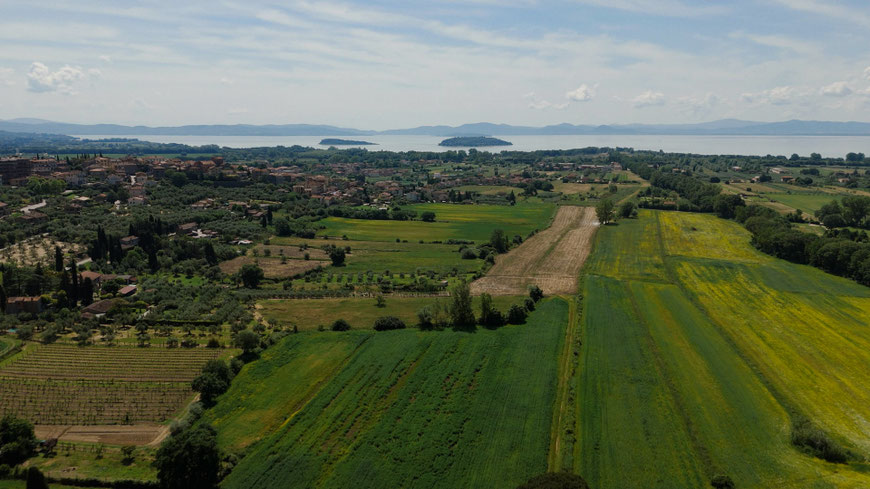destination wedding in Umbria at Villa Baroncino a venue on Trasimeno lake. Drone shot