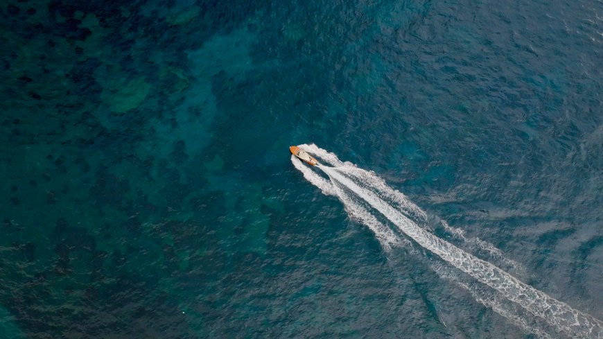 a boat ride along the Amalfi Coast opn the wedding day filming with drone