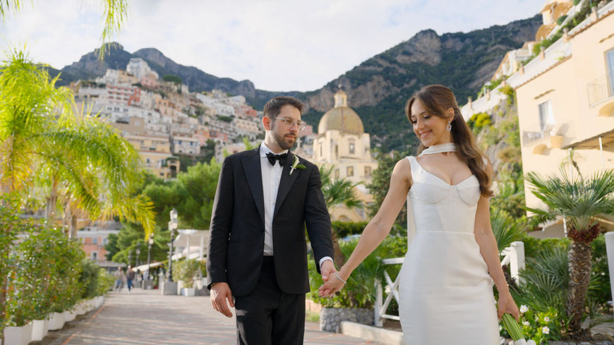 wedding in positano, a couple walking on the amalfi coast