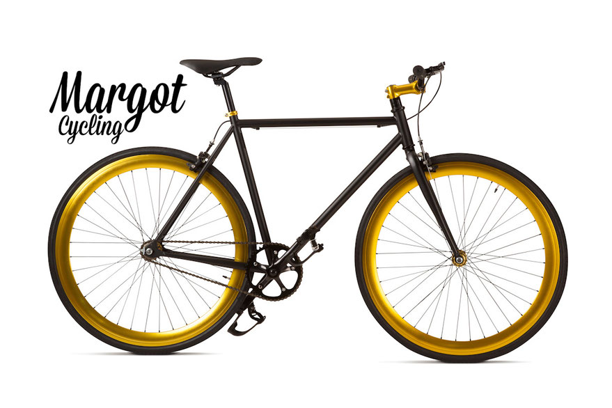 Fixed bike MARGOT ELDORADO. Telaio nero opaco e parti nere. Spicca il luminoso ORO anodizzato di cerchi, collarino, pipa manubrio e mozzi. Luminosità ed eleganza!
