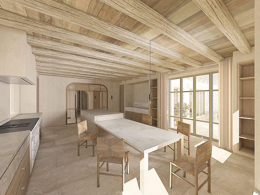 Construction d'une maison dans le var près de Saint-Tropez. Cuisine sur-mesure en bois et plan de travail en pierre naturelle