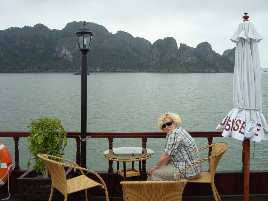 With boat at Halong Bay