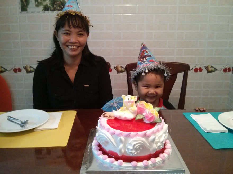 Luong and Dung with birthday cake