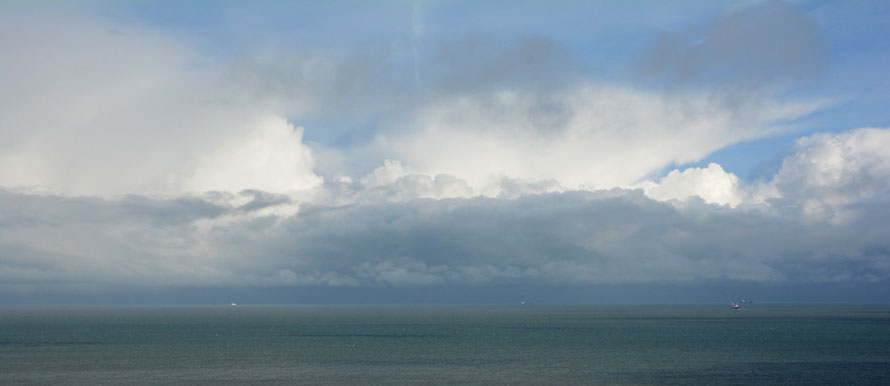 Snow clouds over the Strait. 