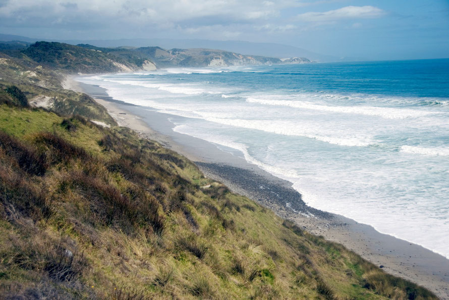 Looking south from the Cowin Road beyond the Otuhie River towards the distant Kahurangi Point and a 40km stretch of coast with no habitation, roads, or anything.