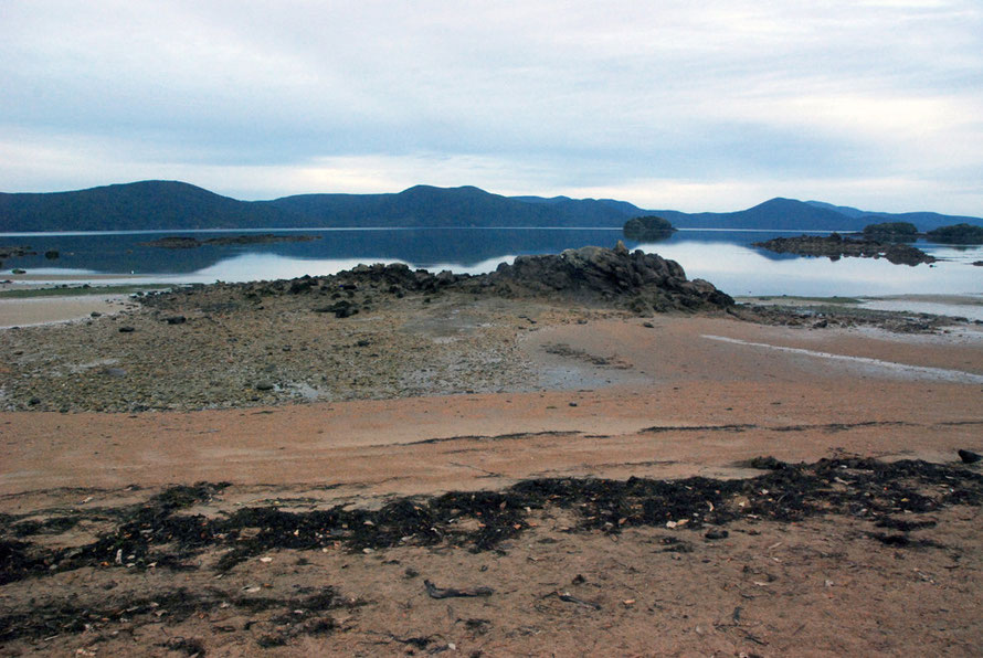 Boulder Beach with the tide right out looking across to the uninhabited western ranges of Stewart Island