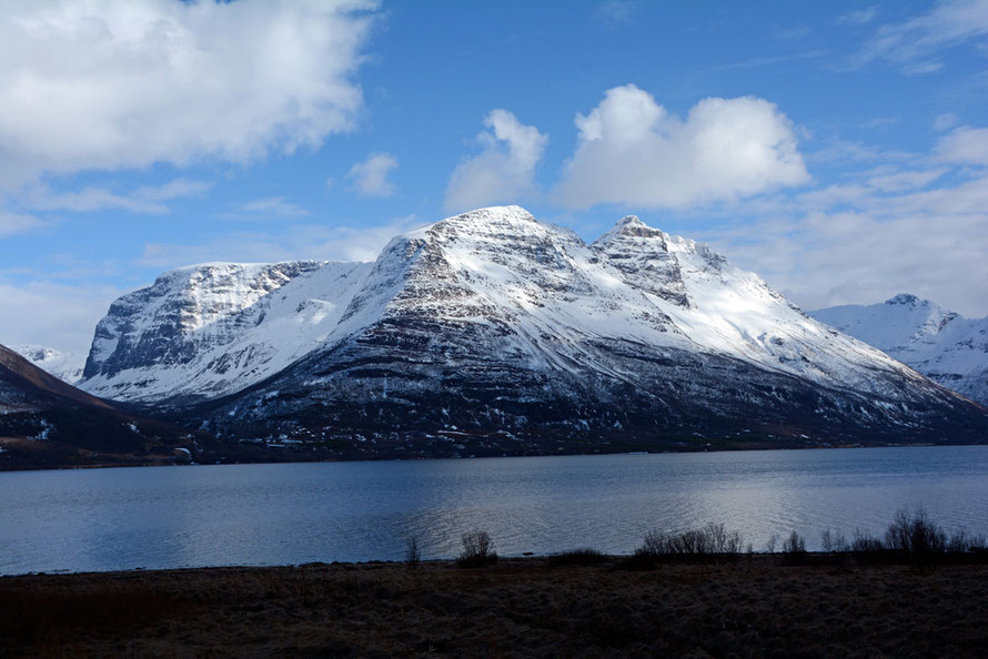 The Lyngen Line: looking east across the Storfjorden to the massive mountain blocks that rise very steeply from the fjord side to 1,200 to 1,500 metres (April 2015). Imagine this scene in the months of winter darkness when average temperatures are -6.5C.