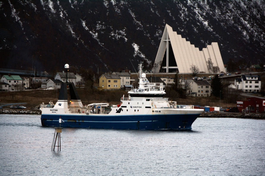 Havtind, part of the Havfisk fleet, passing through Tromsø Harbour. Havfisk (formerly Aker Seafoods) operates a fleet of 15 whitefish trawlers and was caught up in the illegal dumping of cod from one of its trawlers in 2010.