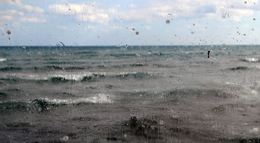 The waves crashing onto the Varoshiotis Seafood Restaurant on the Larnaca seafront, February 2011.