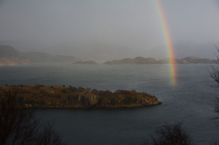 A rainbow as the day ebbed away into a stormy night over Loch Torridon. Looking over Eilean an Inbhire Bhain towards Camas Rhuadh near Shieldaig/Sildaig and Eilean a' Chaoil.