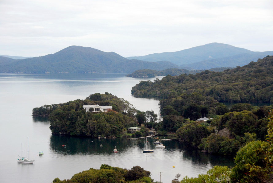 View from the lookout above Oban over Golden Bay, Prices Inlet to (L) Mt Rakeahua (681m) and in the distance Mt Anglem/Hanahui (980m), Stewart Island.